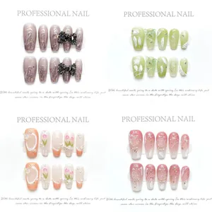 Macro detail of handmade press-on nails featuring marble textures and 3D floral designs