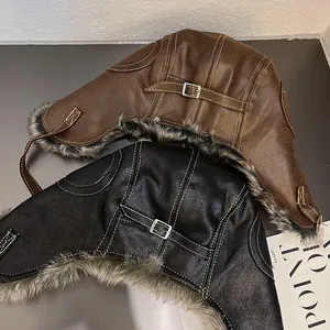 Faux leather aviator trapper hat with warm faux fur lining in black and brown colors