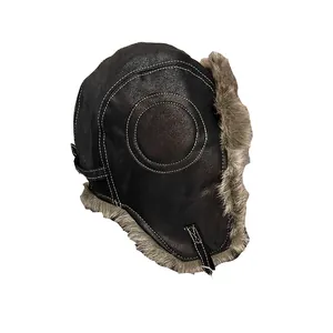Brown faux leather trapper hat with grey faux fur lining and white contrast stitching