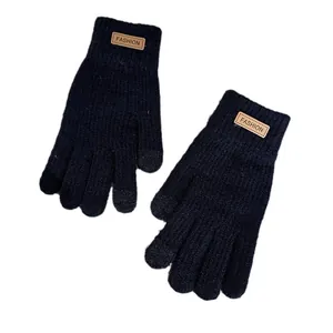 Navy blue winter knitted gloves with touch screen fingers and ribbed fashion cuffs