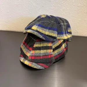 Classic plaid newsboy caps in gray and red wool blend for men and women, autumn style