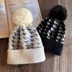Houndstooth knit beanies with fluffy faux fur pom-poms for winter warmth and fashion