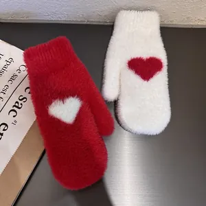 Thick plush heart mittens in red and white asymmetric design for winter warmth