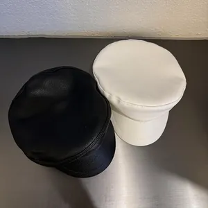 Classic black and white PU leather baker boy hats with lychee texture and fine stitching