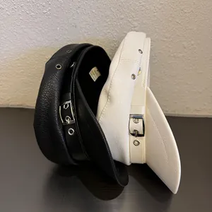Retro PU leather newsboy caps in black and white with metal buckle and strap detail