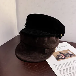 Vintage suede baker boy hats in black and dark brown with elegant metal side buttons