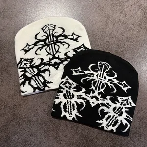 Gothic cross patterned jacquard knit beanie in black and white street style