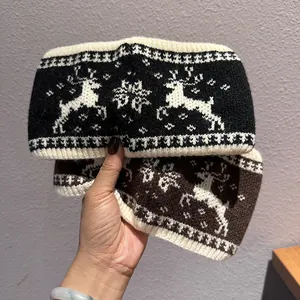 Winter knitted headband with jacquard deer and snowflake pattern for warm ear protection