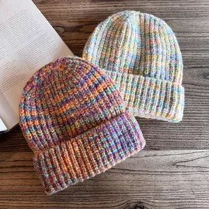 Chic gradient knit beanie hats in colorful chunky yarn for winter warmth and comfort
