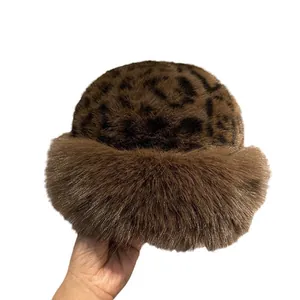 Women's leopard print plush bucket hat with thick faux fur lining for winter warmth