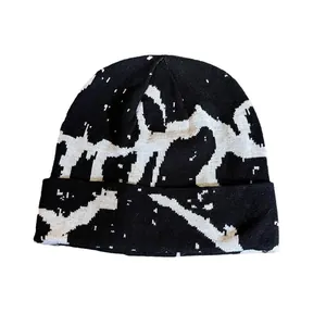Fashionable black and white striped jacquard knitted beanie with abstract street pattern