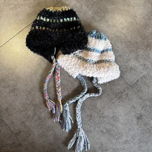 Women's warm plush earflap beanie hats in black and beige with vintage stripe details