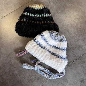 Thick plush winter trapper hat with colorful stripes and braided tassels for women