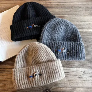 Knit beanie set with puppy embroidery in black, dark grey, and beige colors