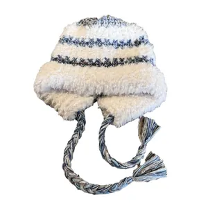 Winter plush ear protection knit hat with white fair isle patterns and tassels