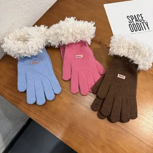 Women's warm winter knitted touchscreen gloves with plush cuffs in blue, pink, and coffee