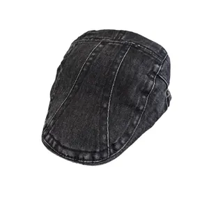 Vintage washed black denim flat cap with distressed texture and classic panelling design