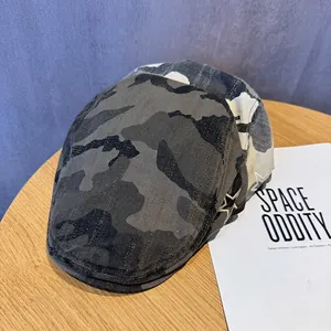Vintage camouflage flat cap for women with distressed texture and star embroidery