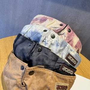 Detail view of retro washed cotton hats featuring GSIOR leather patches in multiple colors