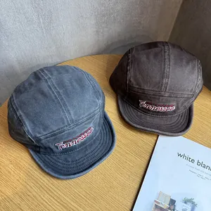 Detail of vintage canvas camper cap with red Tennessee embroidery and five-panel design