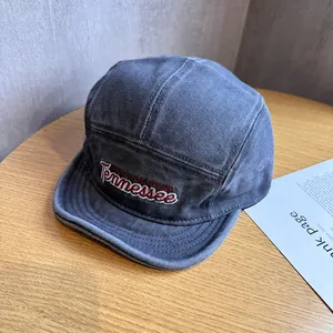 Detail of vintage washed charcoal 5-panel cap with red Tennessee embroidery and stitching