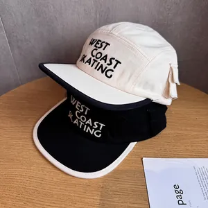 Flat brim camper hats with West Coast Skating embroidery and unique side pocket detail