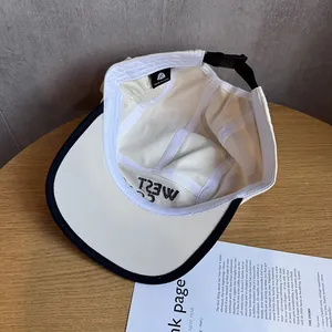 Detailed interior of the vintage cotton baseball cap showing the adjustable buckle and sewing