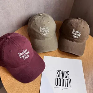 Vintage cotton baseball caps in burgundy, green, and brown with Sunday Running Club embroidery