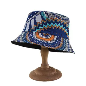 Retro bohemian pattern bucket hat with colorful geometric tribal prints on wooden stand