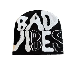 Unisex black and white knit beanie with BAD VIBES letter pattern for streetwear style