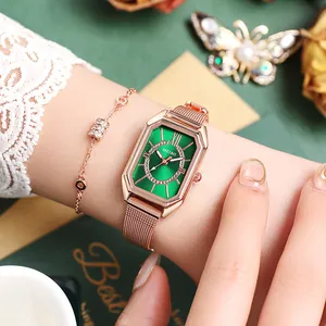 Elegant square green dial watch and rose gold bracelet set for women on a green background