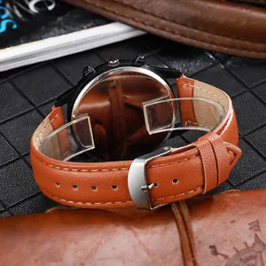 Montre à quartz pour homme avec bracelet en cuir marron et boîtier en métal noir poli chic