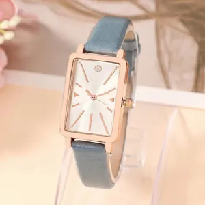 Elegant women's rectangular quartz watch with rose gold case and grey-blue leather strap