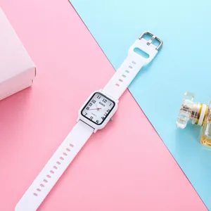 Minimalist square quartz watch with white strap on a stylish pink and blue background