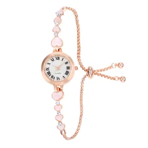 Elegant rose gold heart bracelet watch with white dial and adjustable sliding chain