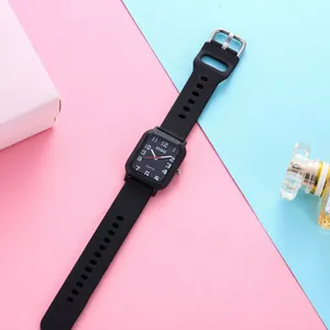 Close-up of black square quartz watch with Arabic numerals on pink and blue background