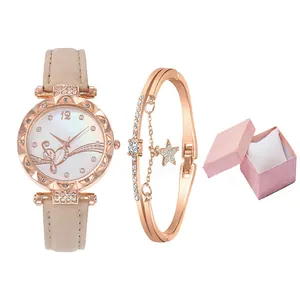 Elegant rose gold watch and bracelet set with butterfly theme in a pink gift box