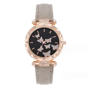 Orologio elegante in oro rosa con farfalle, strass e cinturino in pelle scamosciata