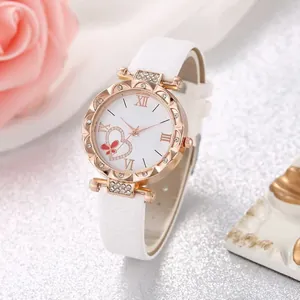 Women's rose gold heart dial watch with white leather strap and crystal bezel