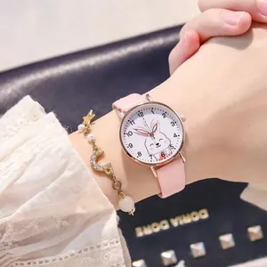 Pink leather strap watch with a cute rabbit dial and a moon star pearl bracelet
