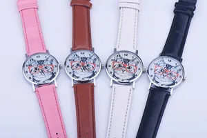 Flat lay of colorful quartz watches for girls featuring cartoon cat dials and leather straps