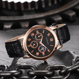 Detail of Geneva quartz watch with black roman numeral dial and rose gold case on gears