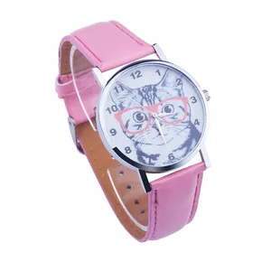 Detail of pink leather watch strap with stitching and cat illustration on the dial