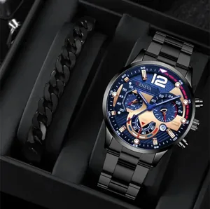 Detail of Geneva business watch set featuring blue dial and black metal Cuban bracelet
