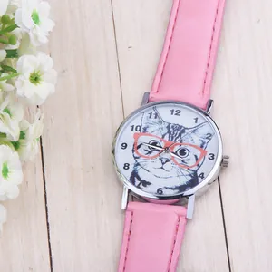 Close-up of pink leather watch strap and white dial with cartoon cat and orange glasses