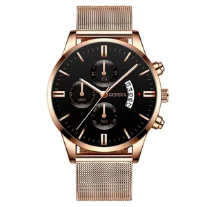 Detail of rose gold mesh watch band with black dial showing calendar and sub-dials