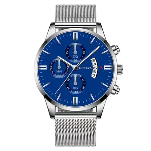 Detailed macro view of the blue watch dial with silver Milanese mesh strap and calendar window