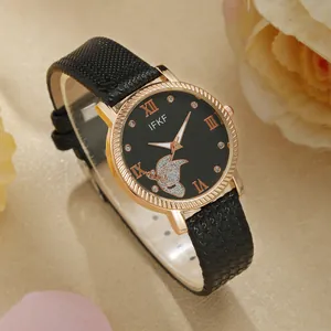 Detail of IFKF women's watch featuring a crystal butterfly dial and black leather strap
