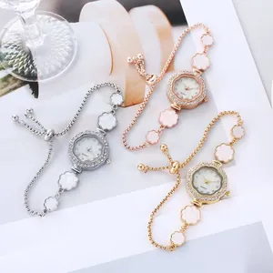 Montre Bracelet Femme Élégante Tournesol en Strass Alliage Montre à Quartz Or Rose Cadran Floral Bijoux de Mode