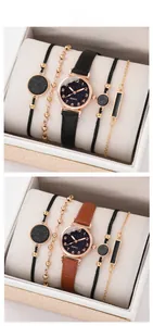 Close-up of elegant women watch and four matching bracelets in a luxury gift box set